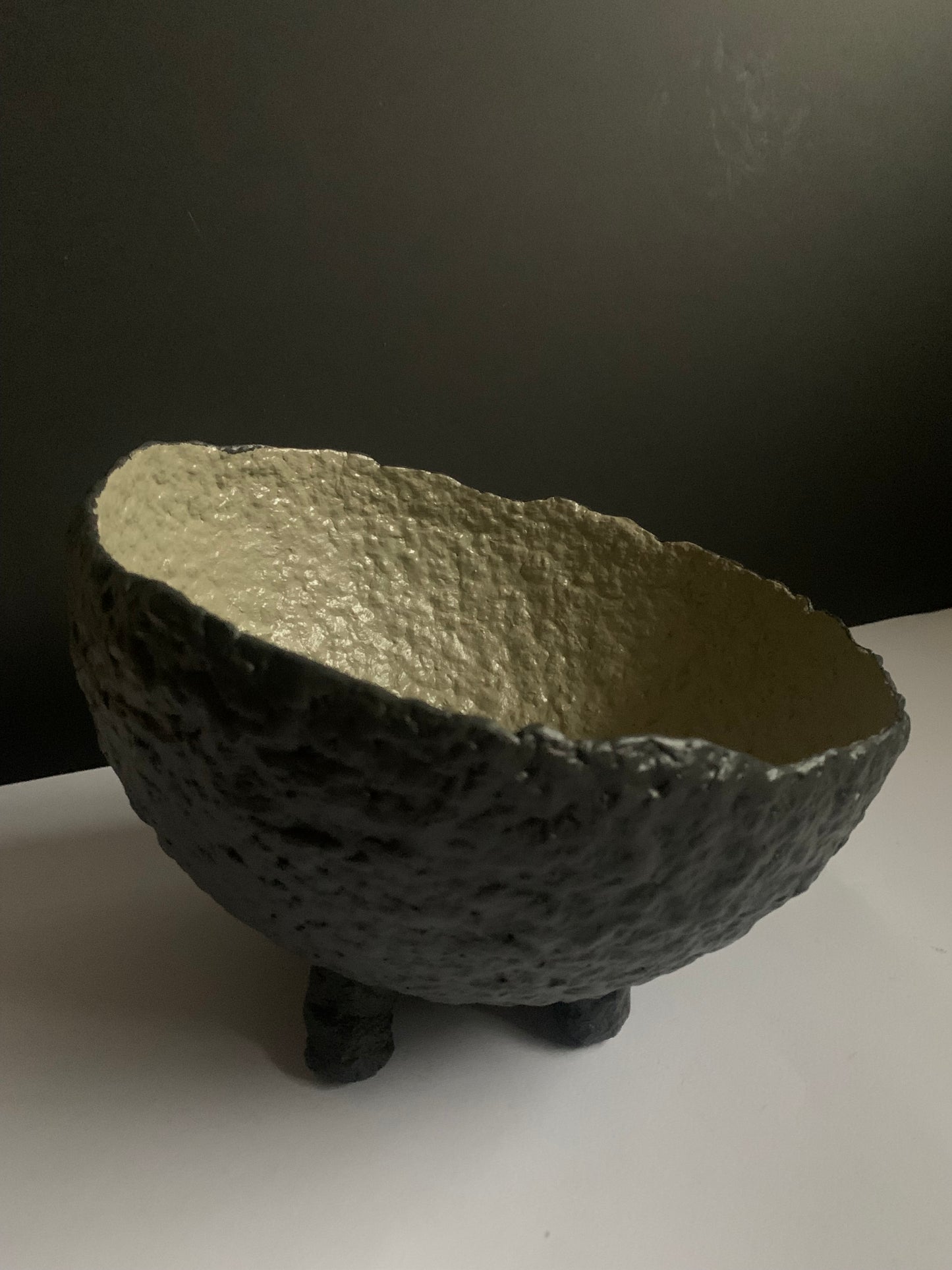 Tilted black bowl