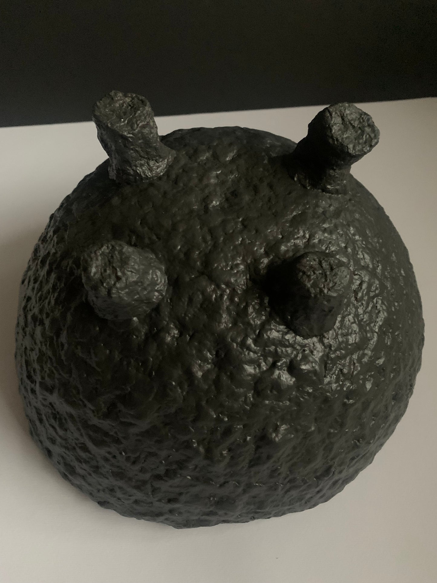 Tilted black bowl